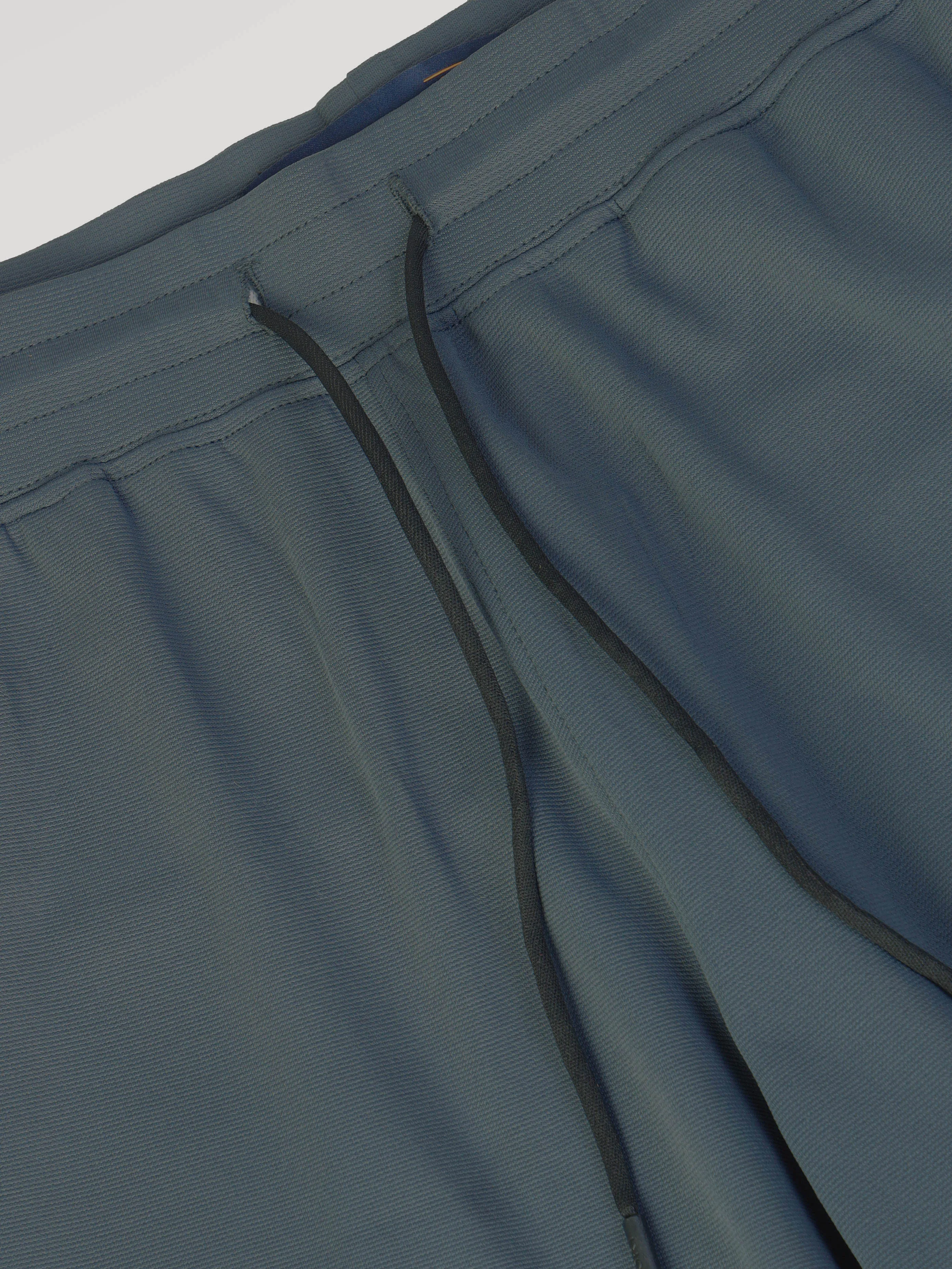 Men Solid Slim Fit Sports Shorts with TS FLEXI