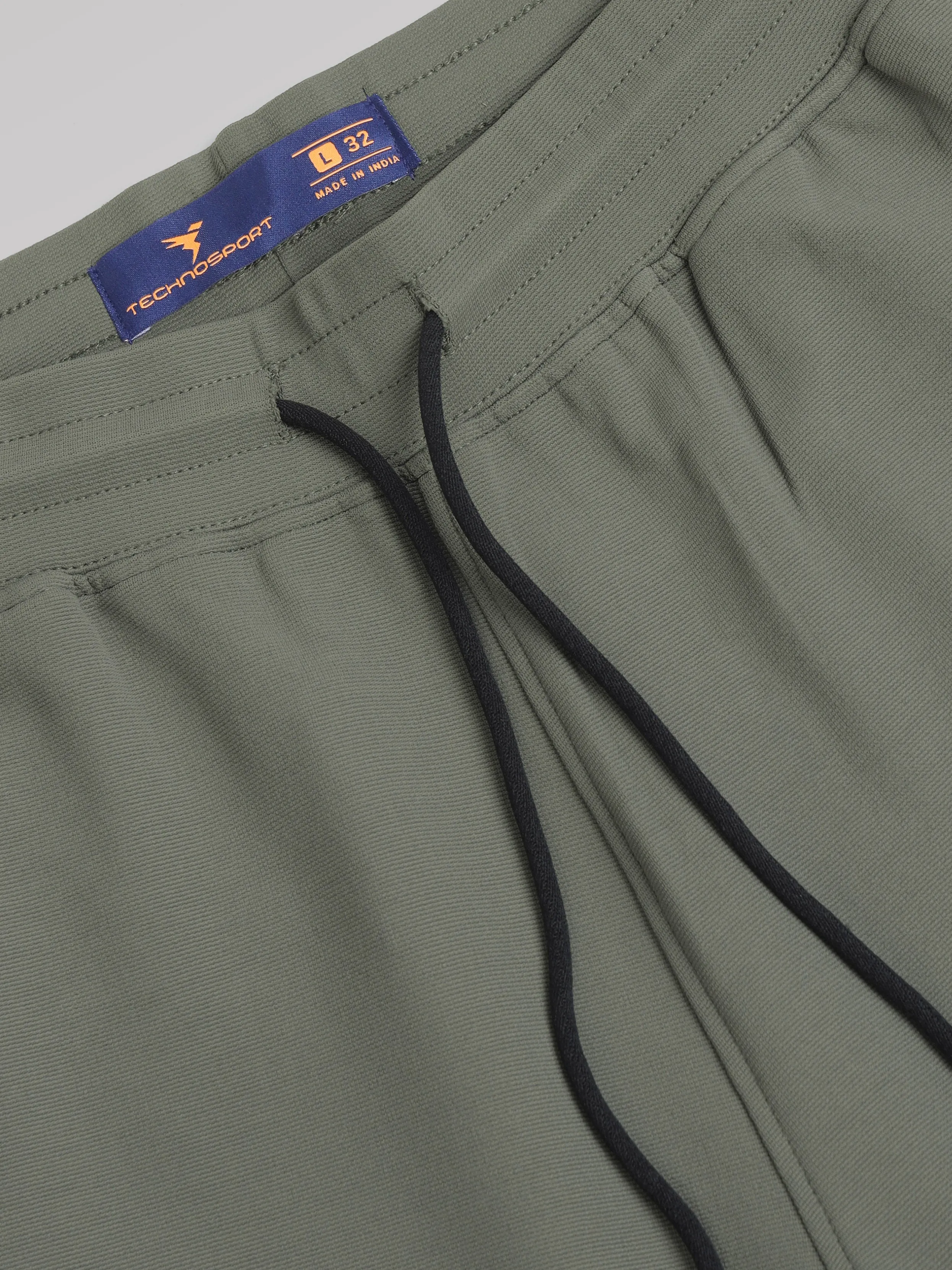 Men Solid Slim Fit Sports Shorts with TS FLEXI