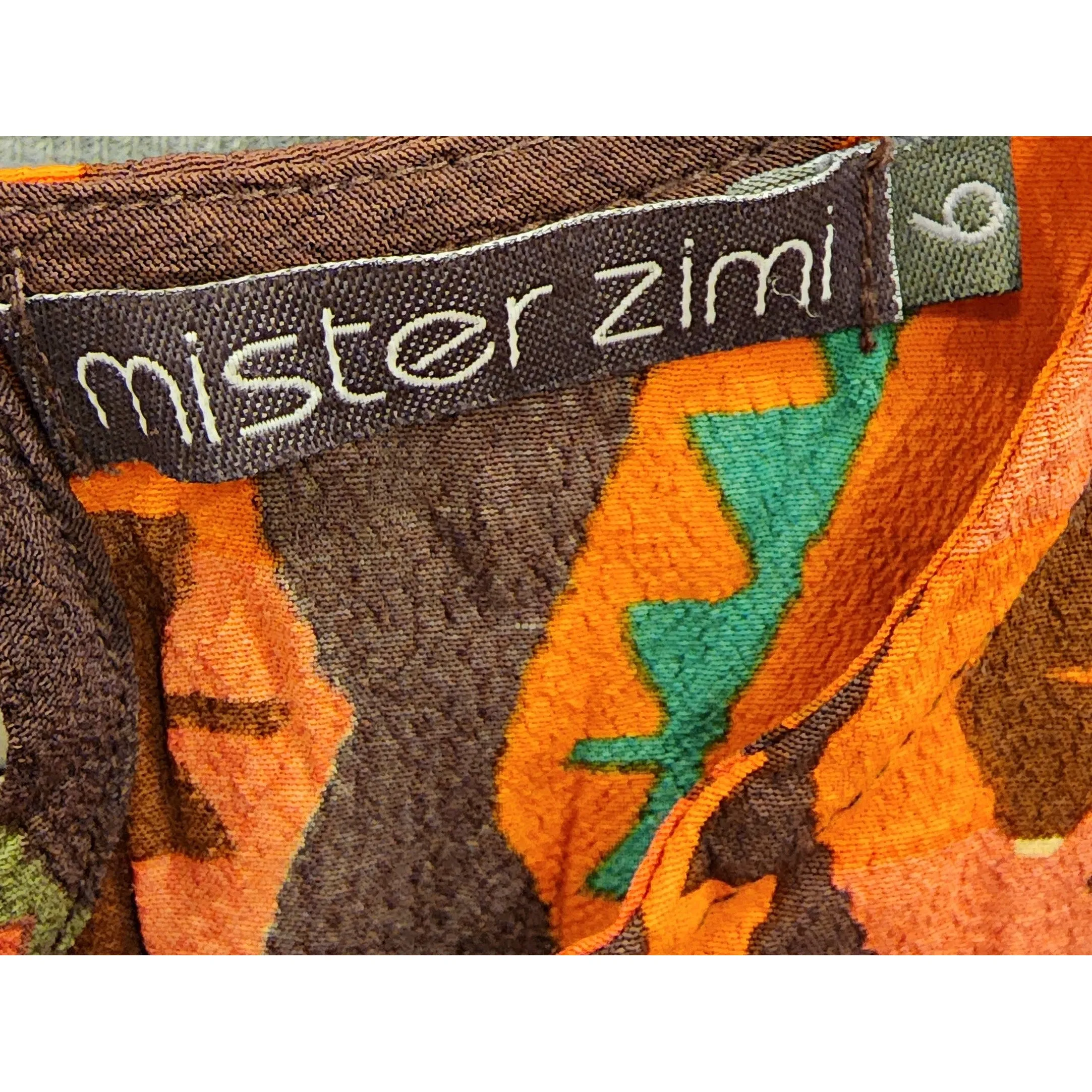 Mister Zimi brown tee shirt with orange, green and beige print size 6