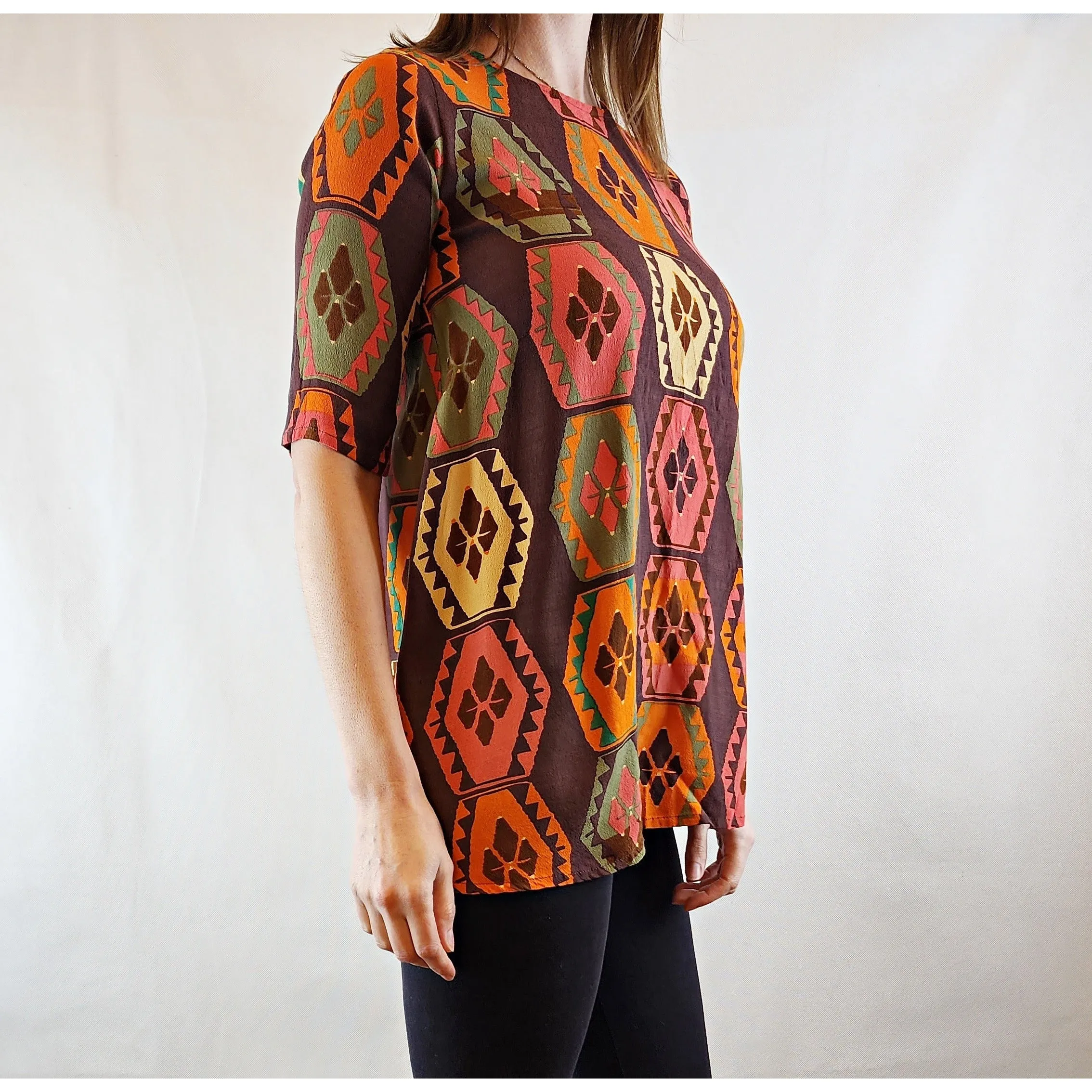 Mister Zimi brown tee shirt with orange, green and beige print size 6