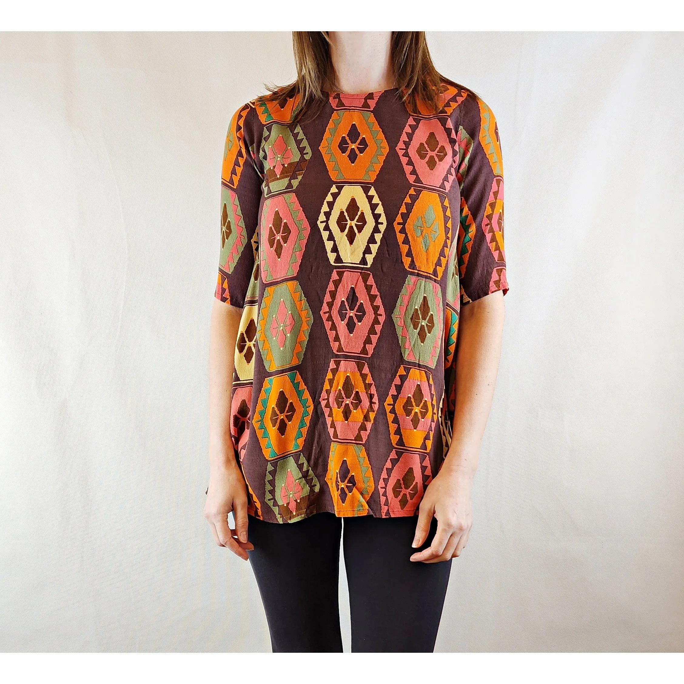 Mister Zimi brown tee shirt with orange, green and beige print size 6