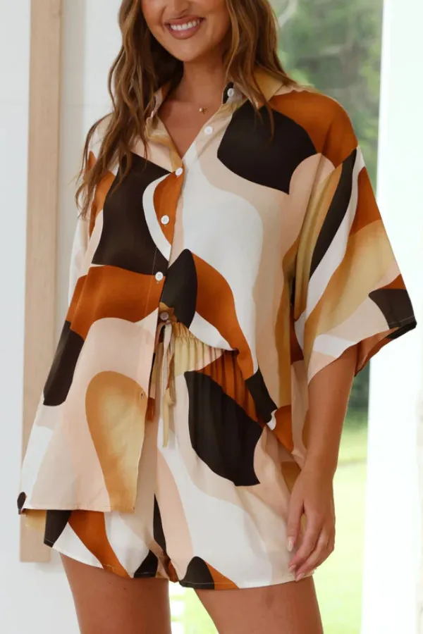 Orange button-down shirt and shorts set