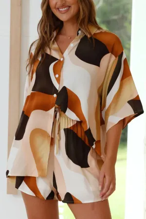 Orange button-down shirt and shorts set