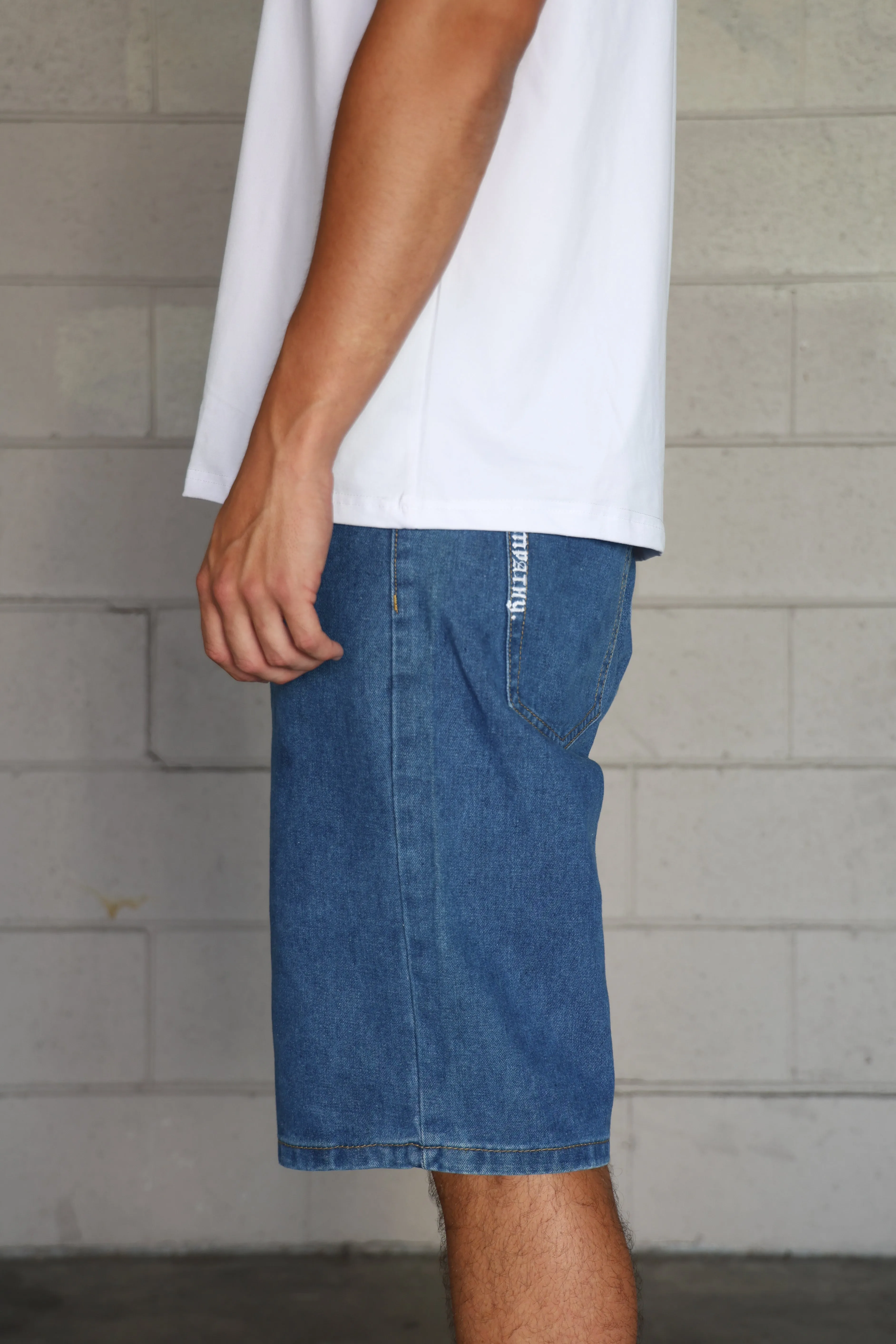 SKEG EMBROIDERED EMPATHY DENIM WALK SHORTS