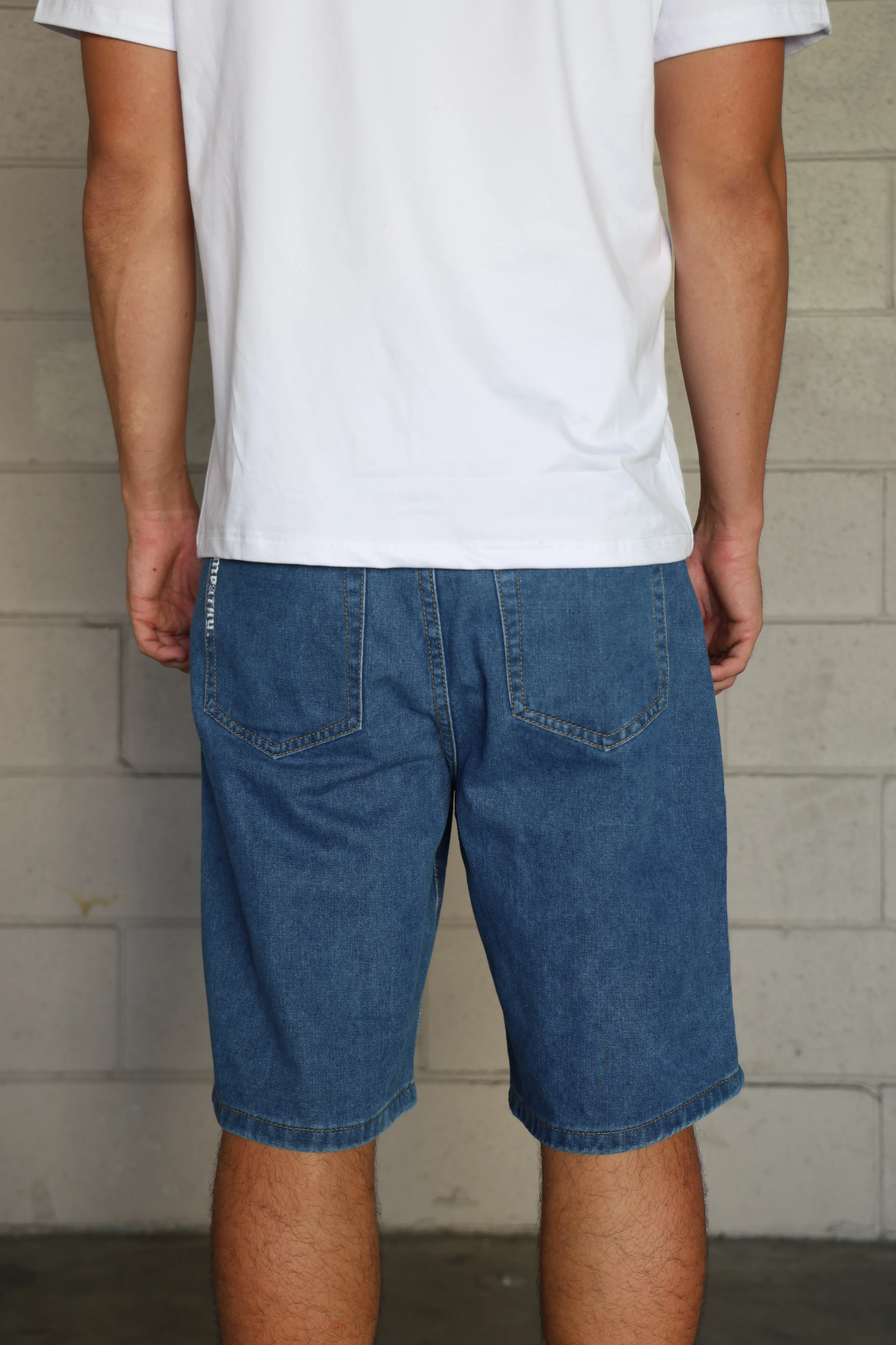 SKEG EMBROIDERED EMPATHY DENIM WALK SHORTS